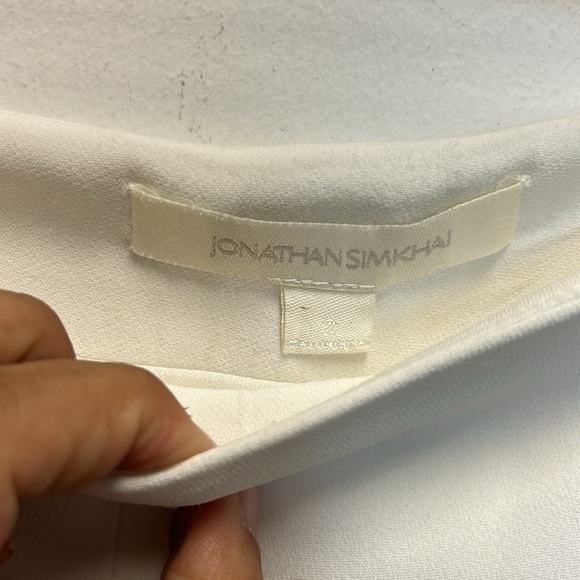 JONATHAN SIMKHAI Lace-up Cropped Crepe Flared Pants In Ivory - Picture 5 of 9